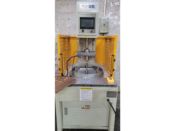 Turntable four-station punching machine